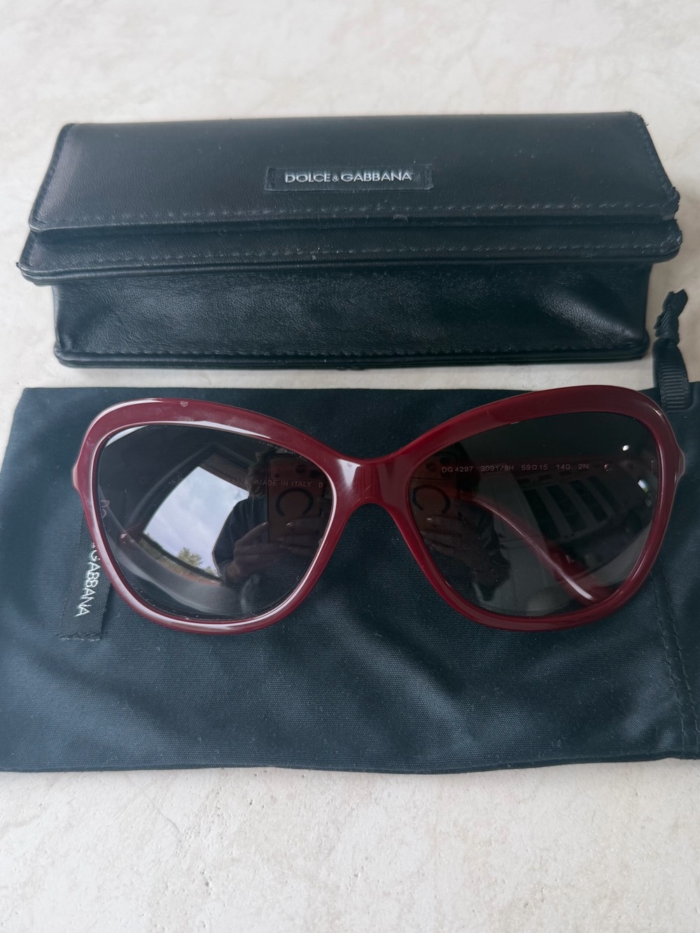Dolce & Gabbana Burgundy Cat-Eye Sunglasses with Dark Lenses